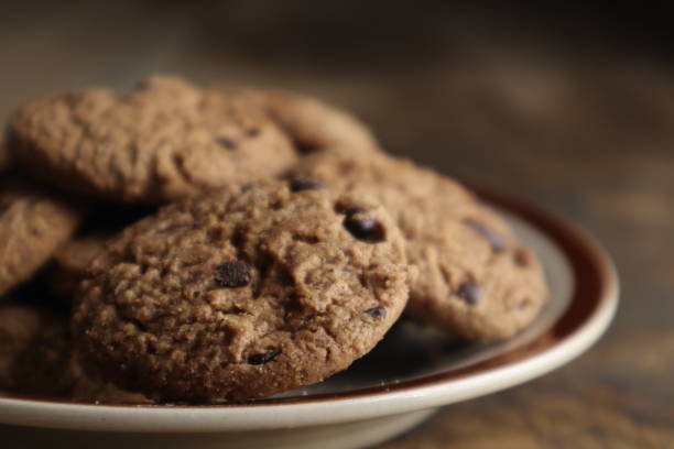 istock chocolate cookies on wooden table. close up 1441825196