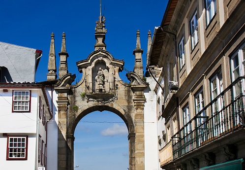 Arco da Porta Nova, XVIII century, Our Lady of Nazareth in a recessed niche. Ancient entrance to Braga city, Portugal.