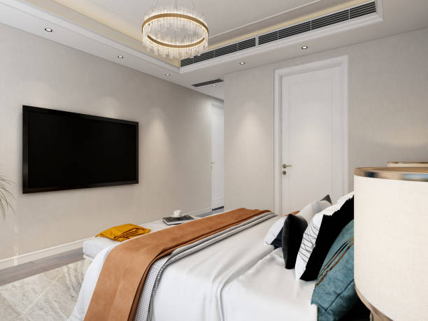 istock 3D rendering, elegant and modern bedroom design, big bed with overcoat cabinet, coffee table, TV, carpet, etc., very comfortable and leisure. 1441829269