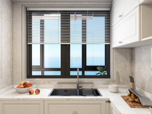 istock 3D rendering,Modern family kitchen design, new cabinets and kitchenware with refrigerators, sunlight from the window. 1441829450