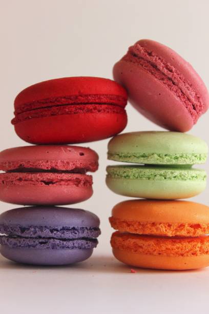 istock Colorful macaroons isolated on white background 1441830601