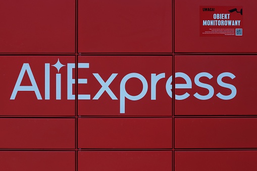 Poznan, Poland – May 19, 2022: Logo new AliExpress parcel locker in Warsaw capital city. AliExpress is an Chinese online retail service. Close-up.