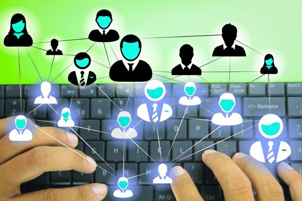 istock hands on with a laptop and a network marketing system, social network or Relationship 1441833628