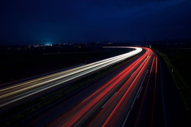 istock Aerial night view of the highway in speed motion effect 1441834042