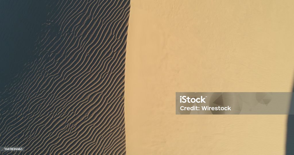 Drone view of the surface at the Glamis Sand Dunes in Imperial County, California, USA A drone view of the surface at the Glamis Sand Dunes in Imperial County, California, USA Adventure Stock Photo