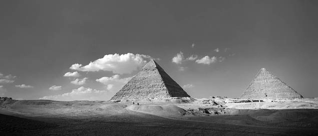 A grayscale shot of the pyramids