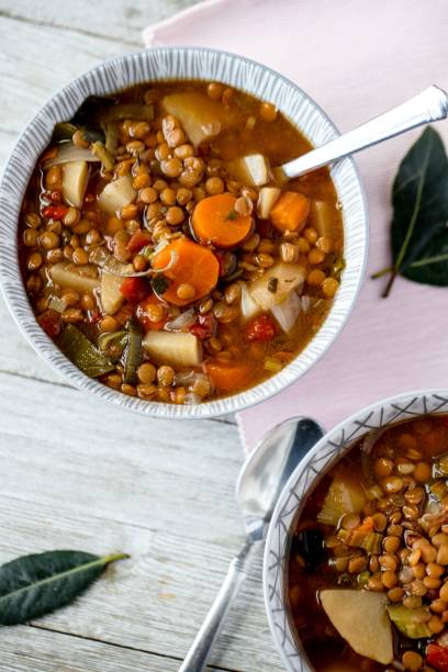 istock Vertical high angle shot of a lentil bean chili on a table 1441835154