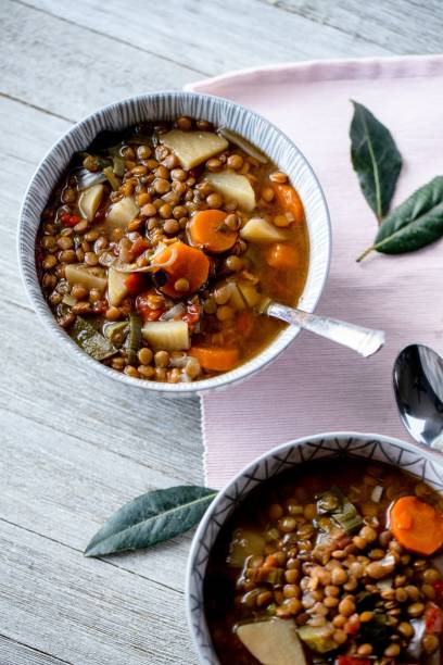 istock Vertical high angle shot of a lentil bean chili on a table 1441835161