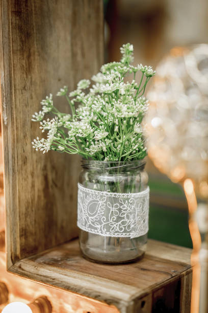 istock Green Plant with Glass Jar 1441836113