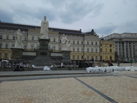 Kyiv, Ukraine – March 18, 2022: The people in Saint Michael's Square preparing sandbags for defense during Russian invasion. Kyiv.