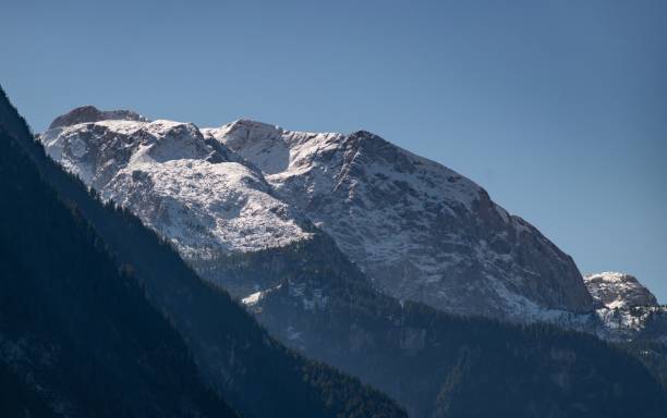 istock Scenic view of Berchtesgaden mountain range on a sunny day 1441838427