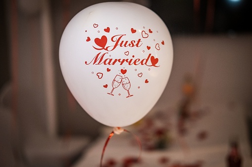 A white balloon with the text Just Married