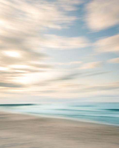 istock Long exposure of sandy beach at scenic sunset 1441838946