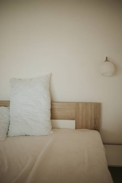 istock Vertical shot of a beautiful bedroom interior design 1441839986