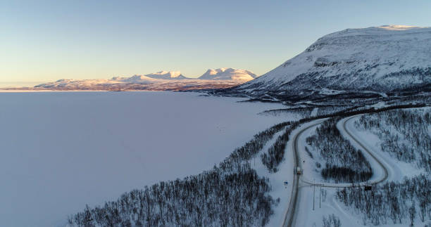 istock Lapporten mountains and lake Tornetrask winter 01 1441840117