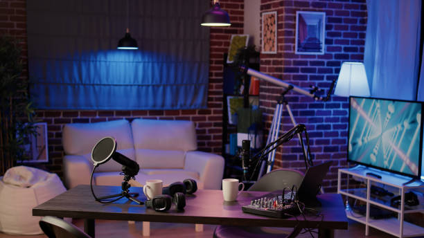 istock Nobody in podcast production studio with professional microphone and headphones for streaming interview 1441840721