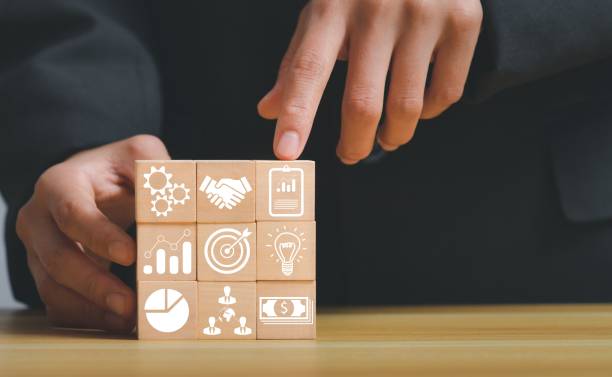 istock Closeup of stack woods' block step on the table with an icon about business strategy and action plan 1441840769