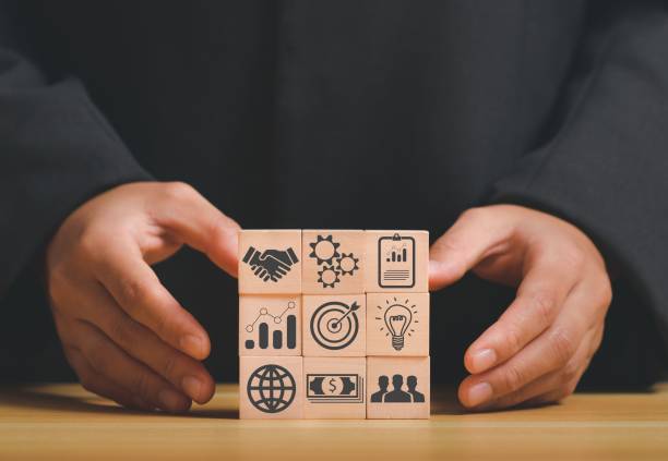 istock Closeup of stack woods' block step on the table with an icon about business strategy and action plan 1441840775