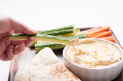 vegetable sticks with hummous or hummus and hand made flatbread