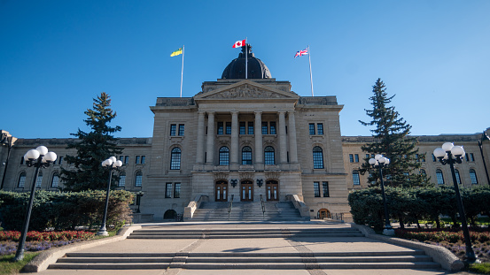 The Saskatchewan Legislative Building under the sunlight and a blue sky in Regina, Cana