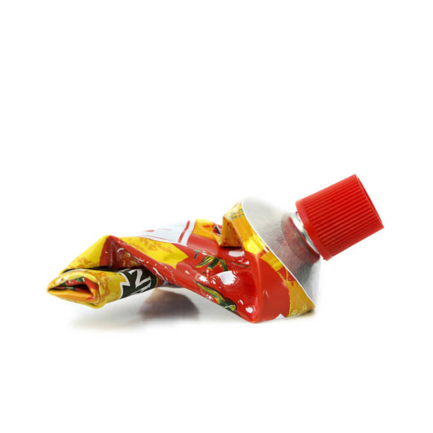 istock Empty tube of tomato sauce isolated on a white background 1441841176