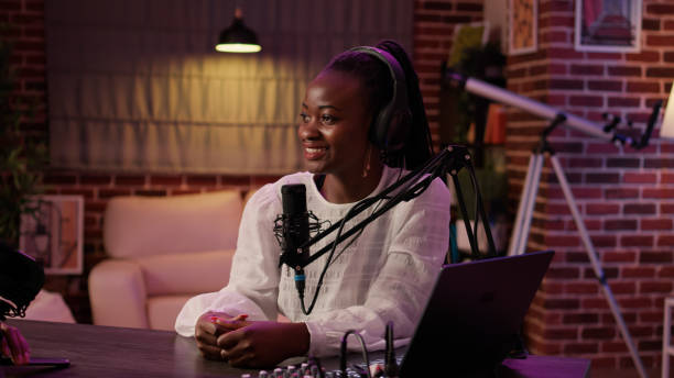 istock African american podcast host interviewing male influencer for online broadcast using professional microphones 1441842688