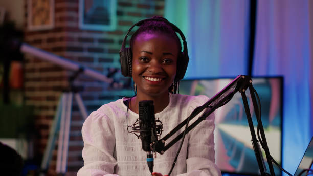 istock Portrait of online radio host smiling confident at camera while broadcasting live using professional equipment 1441843831
