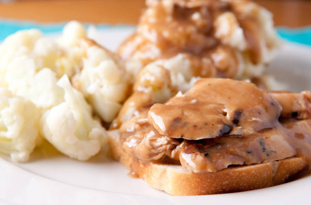 istock hot chicken sandwich with mased potatoes 1441844498