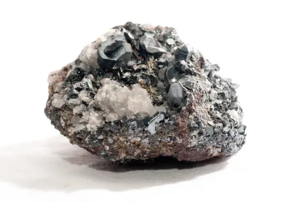 hematite crystal mineral sample on quartz and granite