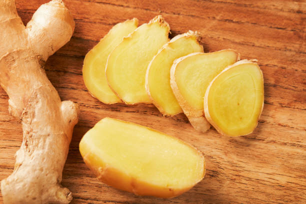 istock Closeup shot of sliced ginger on a chopping board 1441845232