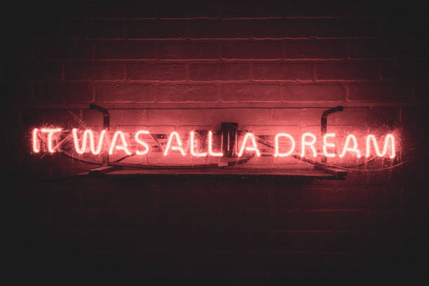 istock Brick wall with it was all a dream neon sign 1441845289