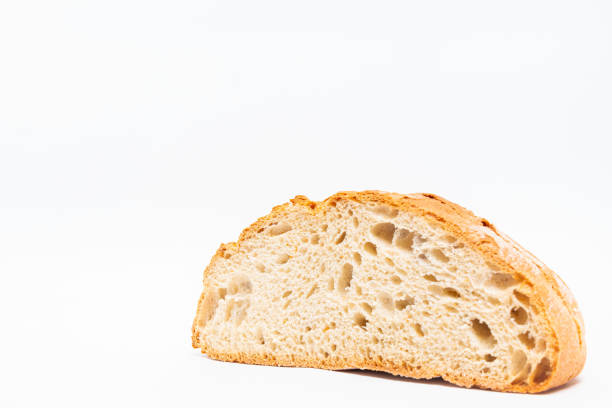 istock Closeup shot of sliced bread isolated on a white background 1441846474