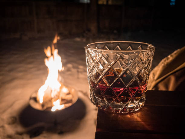 istock Sipping Bourbon by the Fire 1441846505