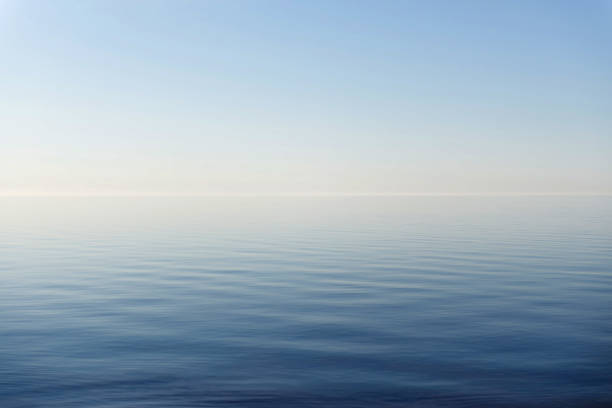 istock Beautiful blue sea under clear sky 1441847154
