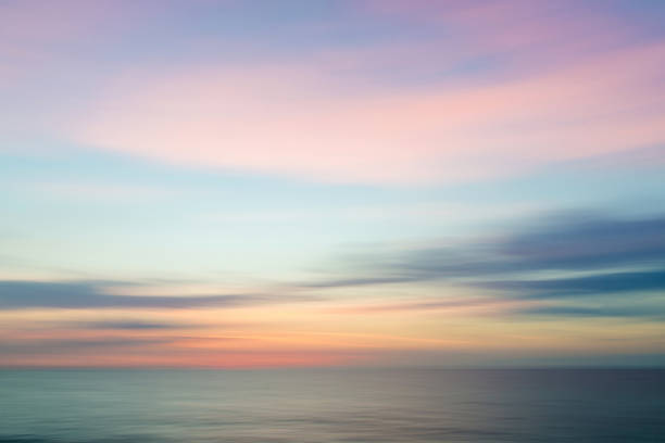 istock Beautiful sunset over a tranquil lake 1441847162