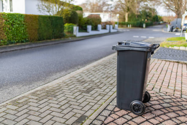 istock View of a garbage container on the street pavement 1441847672