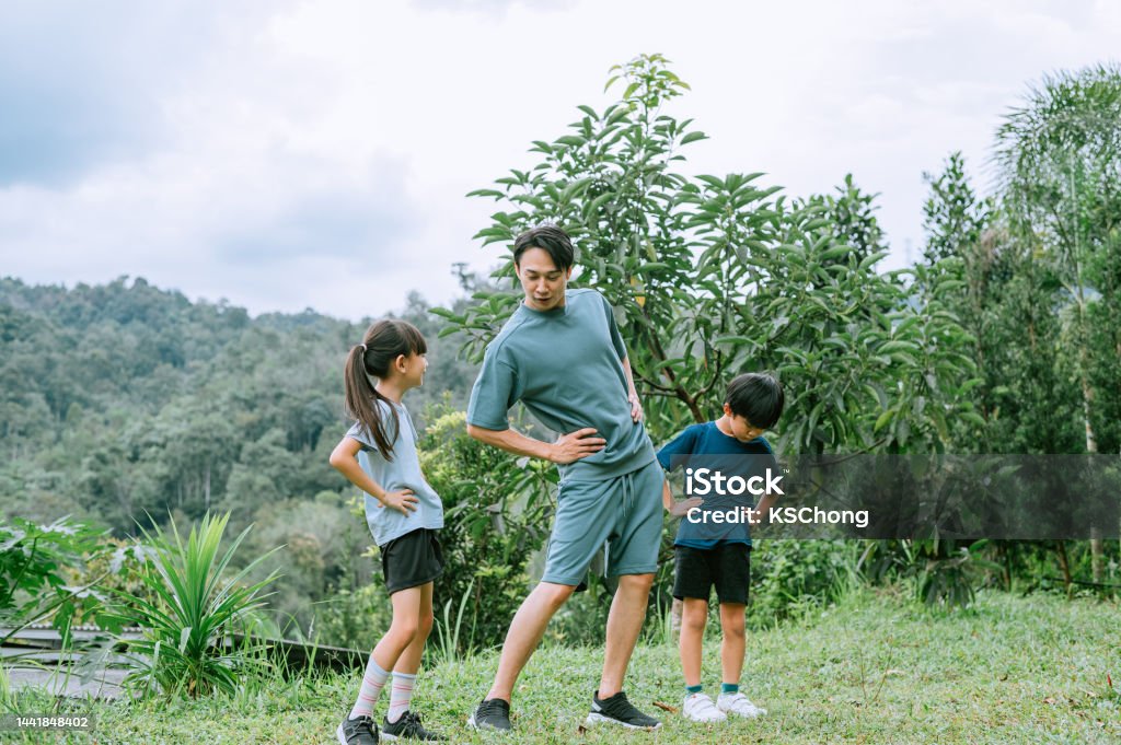 Come, Lets do warming up exercise Exercising, Teenager, Domestic Life, Men, Development, Family 30-34 Years Stock Photo