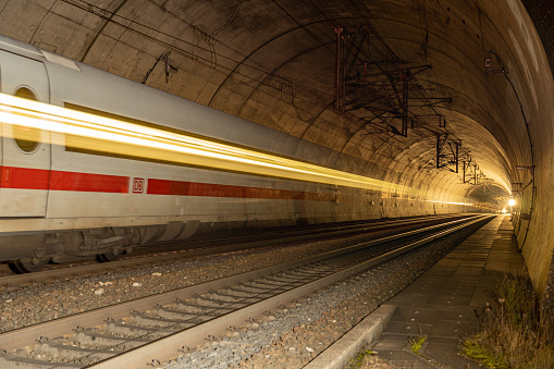 Deutsche Bahn train passes through the tunnel.