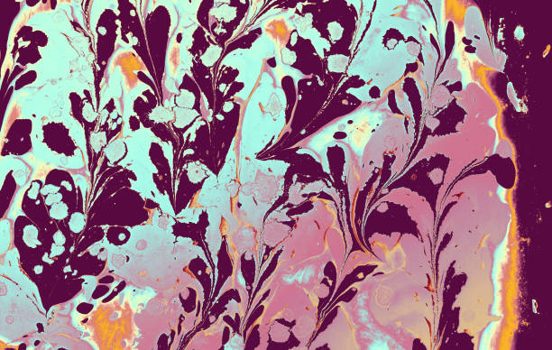 An abstract background with colorful paint splashes and swirly patterns