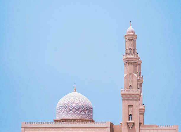 istock Beautiful white mosque under a blue sky in Khasab, Oman 1441851985
