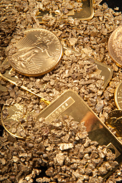 istock gold in coins, nuggets and ingots 1441852583