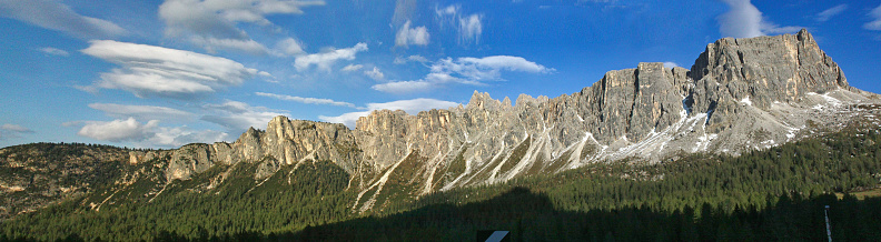 Beautiful panorama view of the Sellastock massif in the italian Dolomites mountains on a very sunny autumn day with dark blue skies