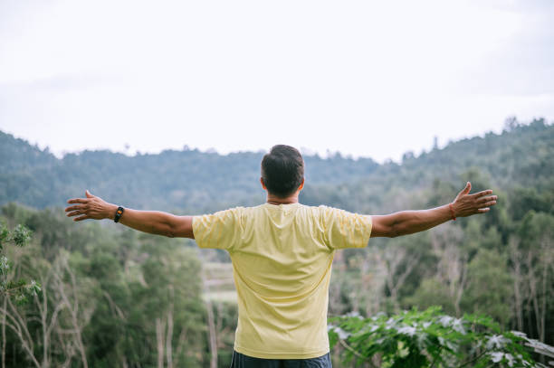 istock Young Asian Chinese man relaxing after exercise 1441854642
