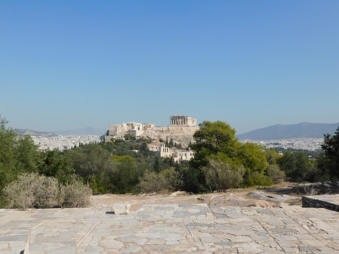 View of the Acropolis and the Parthenon from the Philopappos hill, in Athens, Greece