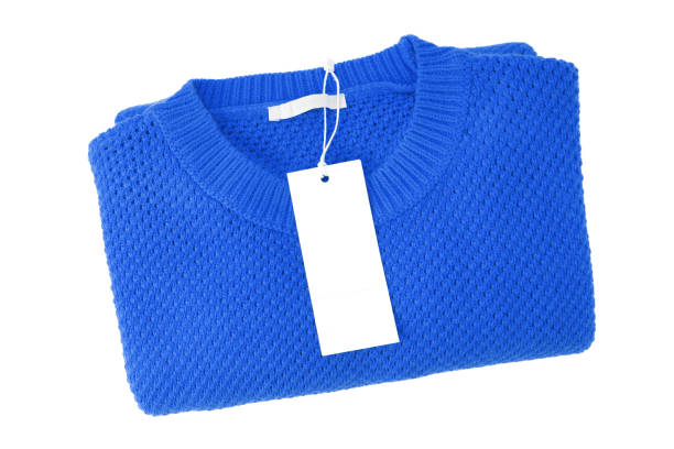 istock White blank rectangular clothing tag on blue knitted sweater isolated on white background 1441873897