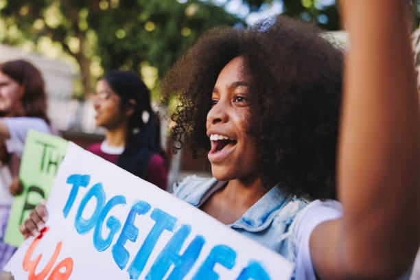 istock Diverse young people fighting to save the earth 1441874940