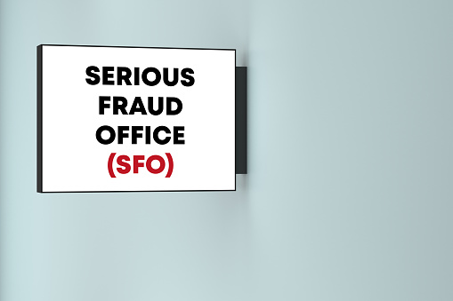 Serious Fraud Office lettering on the lightbox on the wall. Business Terms Concept.
