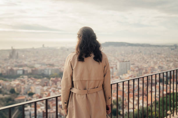 istock Woman looking at Barcelona 1441883078