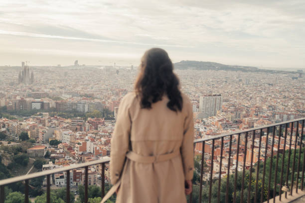istock Woman looking at Barcelona 1441883112