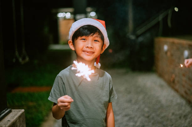 Asian Chinese Child with firework stock photo